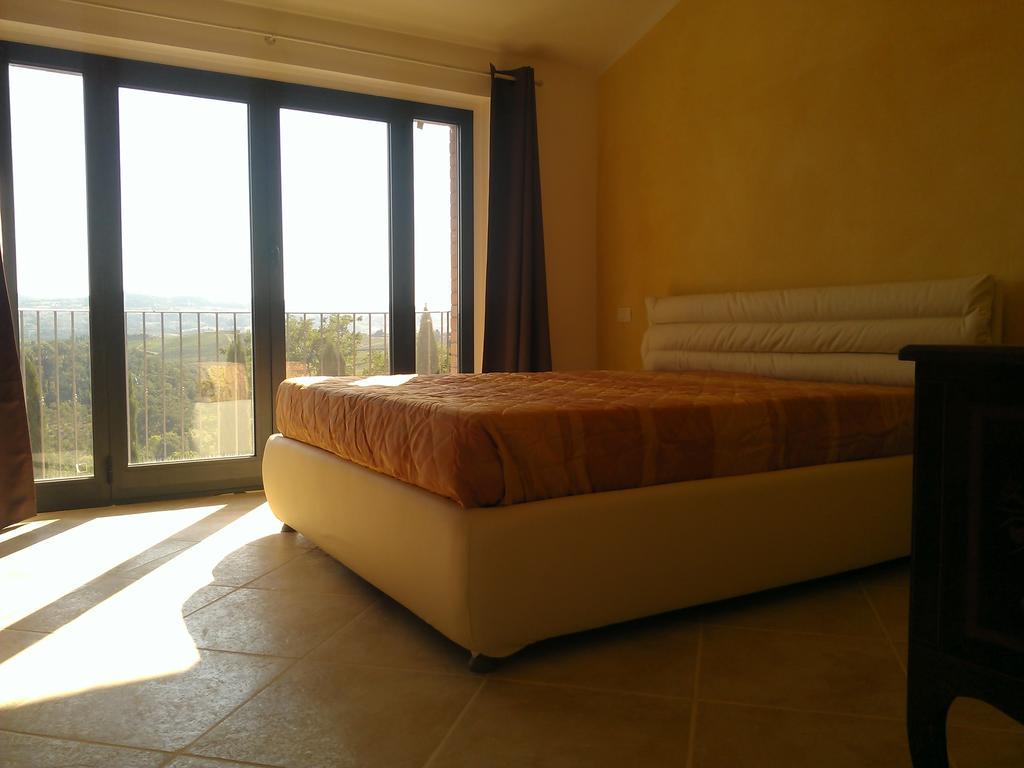 Il Crinale Apartment ซานจีมิญญาโน ห้อง รูปภาพ